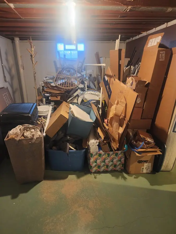 Roll-off dumpster container at job site for 20 Yard Dumpster Rental in Heartland